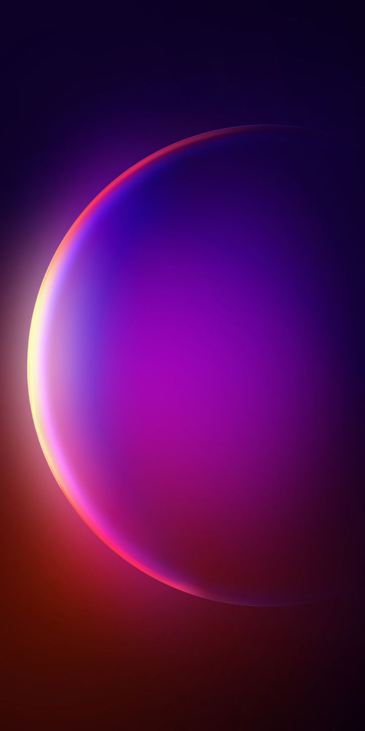 The glowing magenta crescent edge of a planet on dark red and navy.