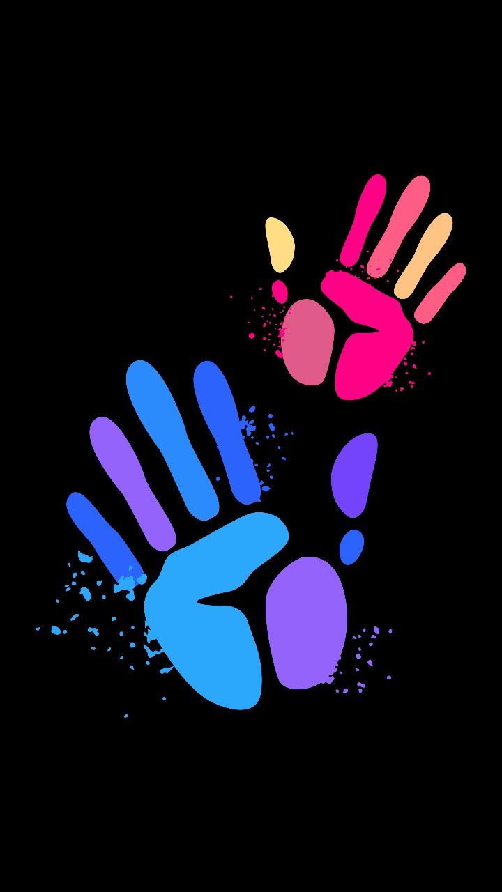 Colourful painted handprints in blue, purple, pink and yellow on black.