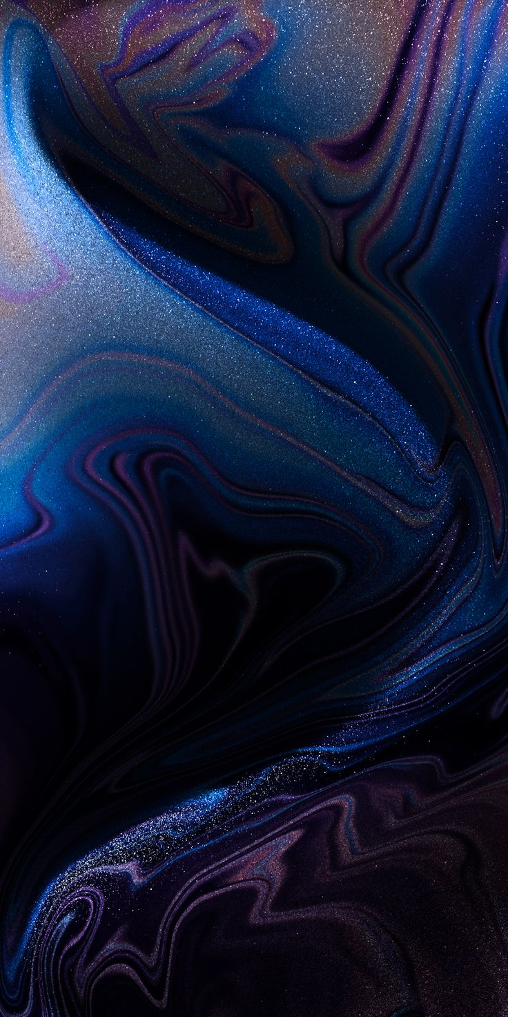 Swirling dark blue and black marble with purple highlights.