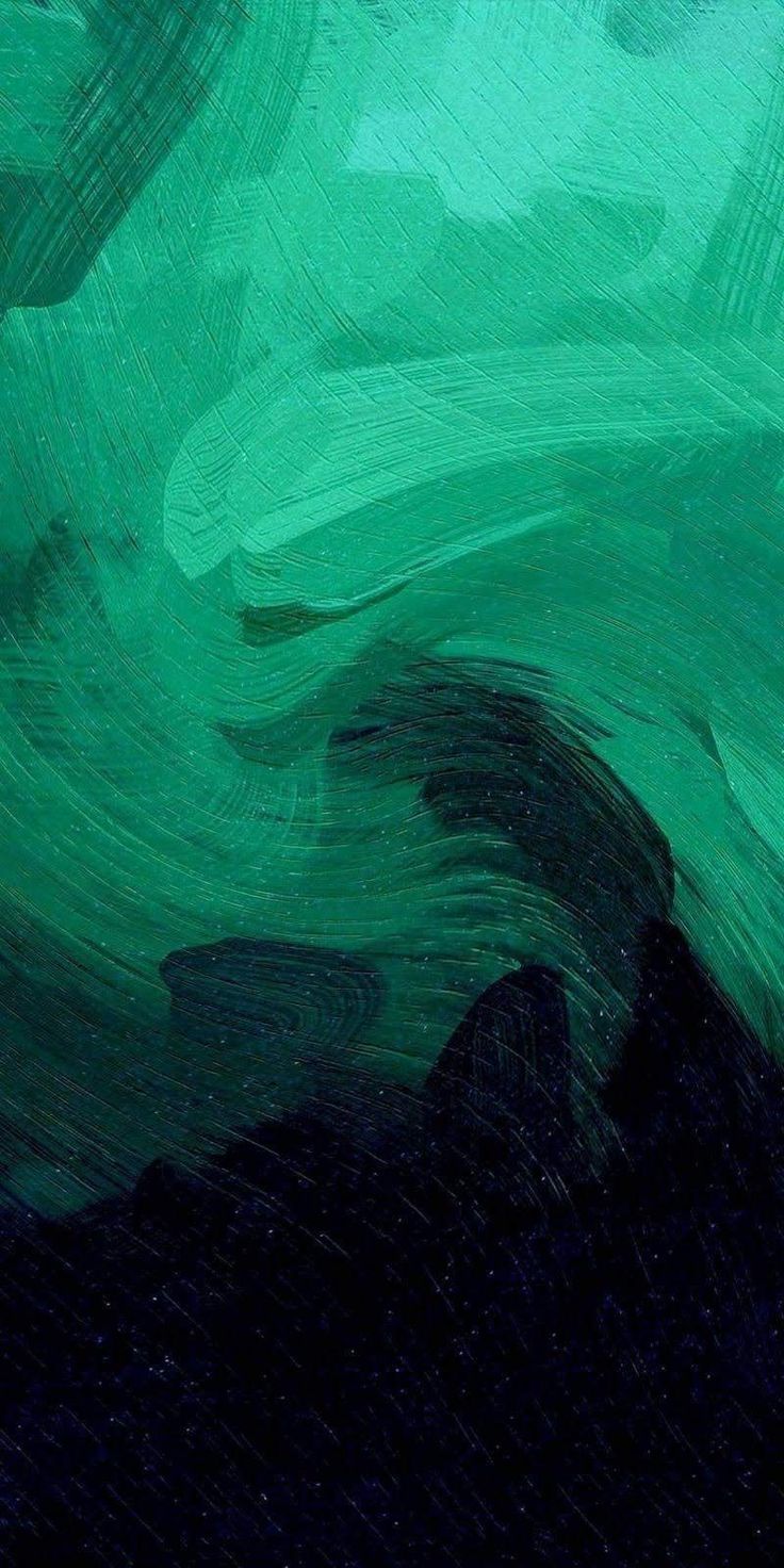 Rough green and black brush strokes in an abstract painting.