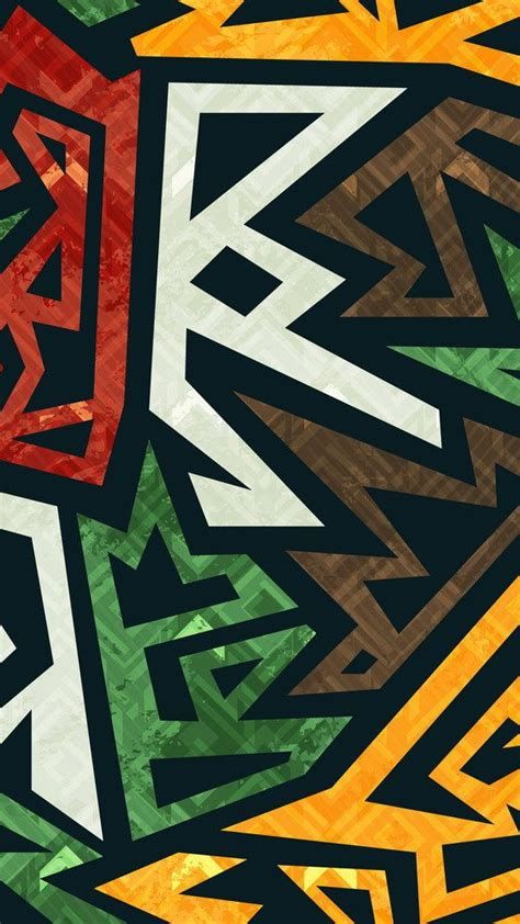 A bold tribal zigzag pattern in red, green, orange and cream on black.