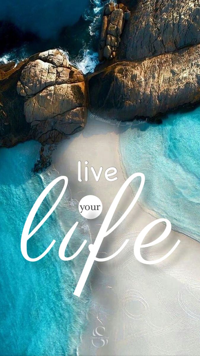 "Live your life" in white script over an aerial view of turquoise water meeting a rocky shore.