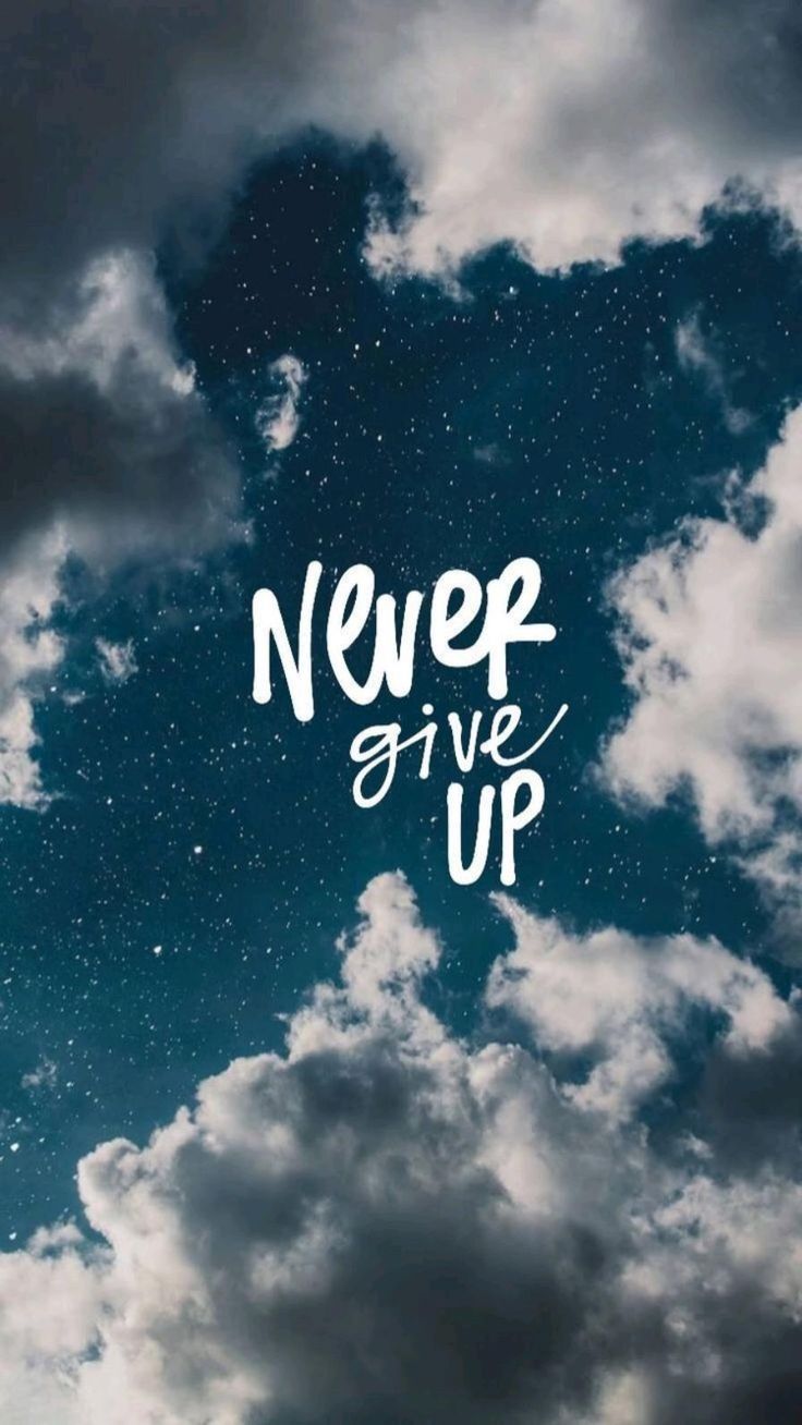 "Never give up" in white script over a starry sky and clouds.