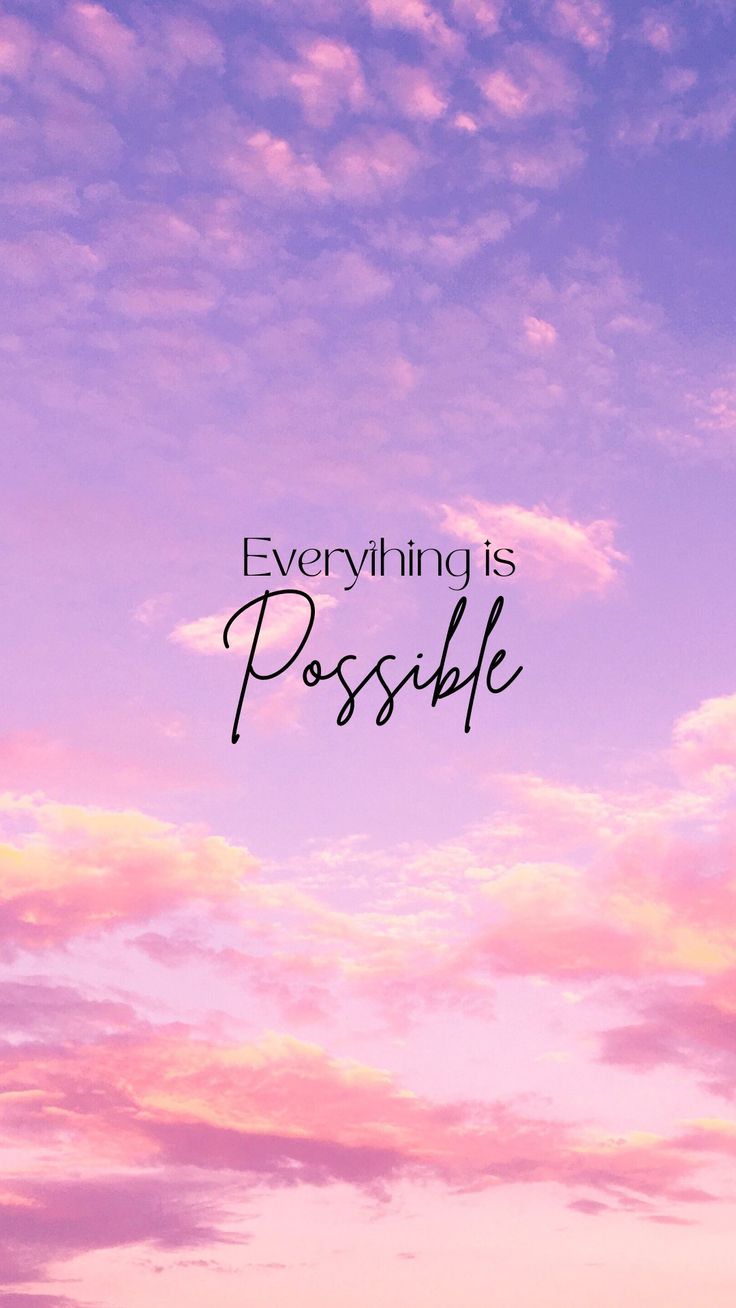 "Everything is possible" in dark script over pink and purple sunset clouds.