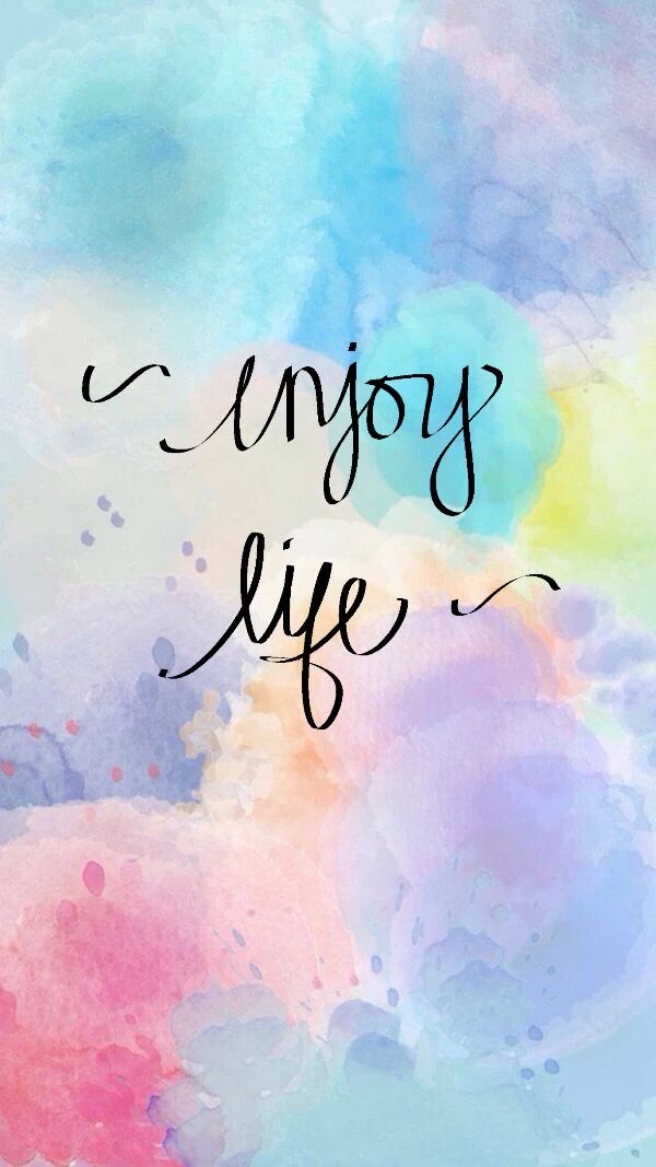 "Enjoy life" in black script on pastel pink, blue and yellow watercolour.