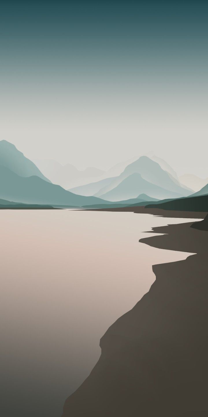 A calm grey lake winding between misty mountains in muted tones.