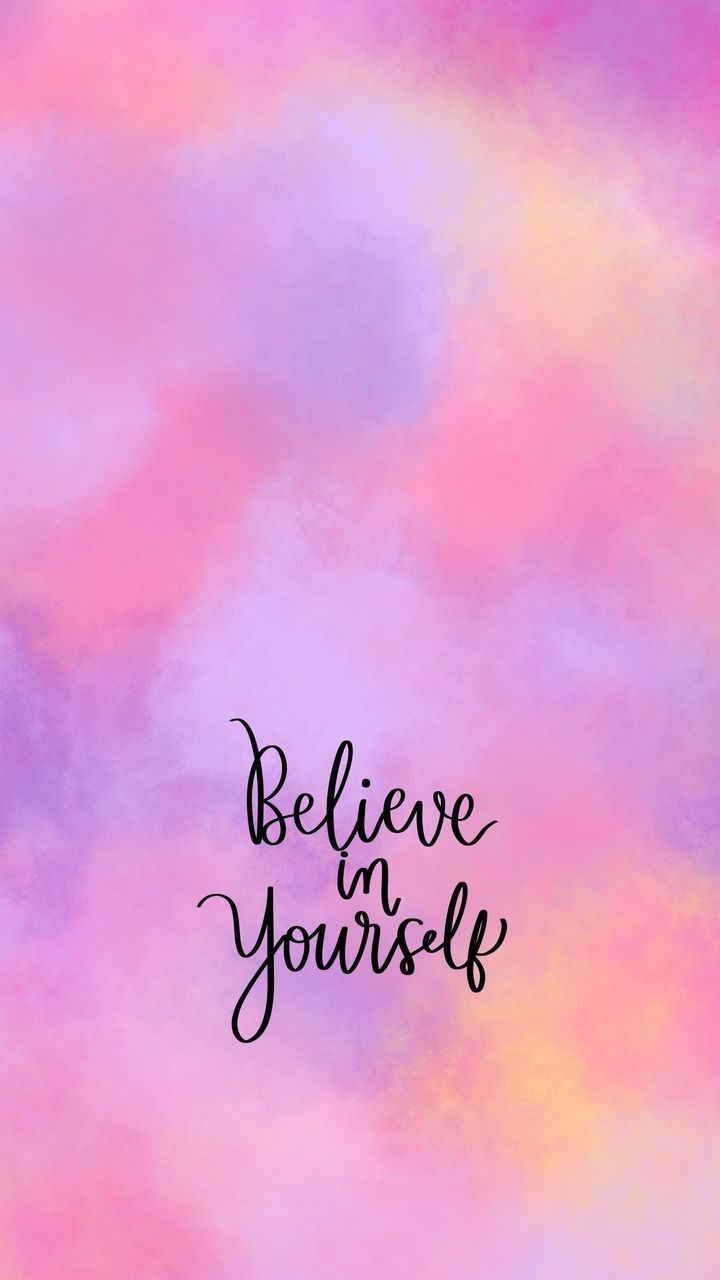 "Believe in yourself" in dark script on pink, purple and orange watercolour.