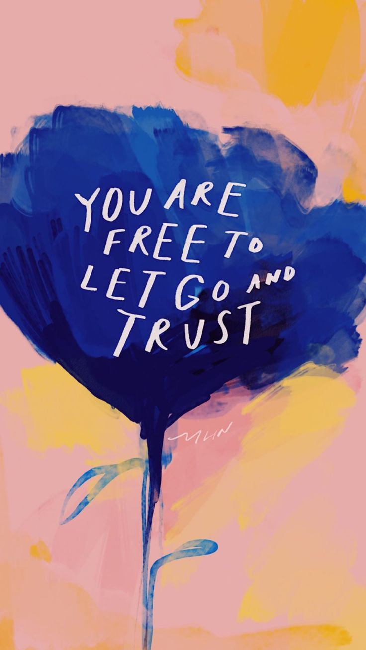 "You are free to let go and trust" in white on a painted blue flower over peach.