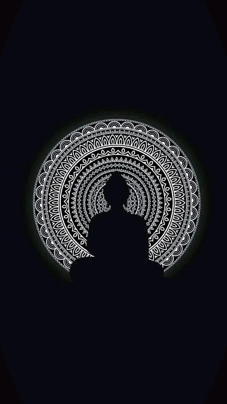 A meditating silhouette in front of a white mandala on black.